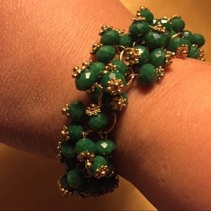 Green and gold beaded bracelet